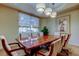 Well-lit conference room featuring a large wooden table and comfortable seating at 1200 Gulf Blvd # 1704, Clearwater Beach, FL 33767
