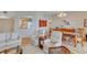 Bright open-concept living space with dining area and comfortable armchairs at 1200 Gulf Blvd # 1704, Clearwater Beach, FL 33767