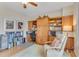 Office space with custom bookshelves and cabinets, rolling chair, and natural light at 1200 Gulf Blvd # 1704, Clearwater Beach, FL 33767