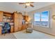 Well lit home office with custom built-ins, rolling chair, and scenic view at 1200 Gulf Blvd # 1704, Clearwater Beach, FL 33767