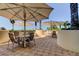 Outdoor dining with multiple tables under umbrellas, offering a serene view of the tropical landscape at 1200 Gulf Blvd # 1704, Clearwater Beach, FL 33767