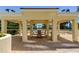 Covered gazebo at the tennis court with table and chairs, offering a shaded spot to relax and enjoy the view at 1200 Gulf Blvd # 1704, Clearwater Beach, FL 33767