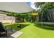 Artificial turf and play-set makes this a backyard ready for fun and entertaining! at 12208 Mcmullen Loop, Riverview, FL 33569