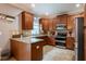 Inviting kitchen features granite countertops, stainless steel appliances and plenty of storage space at 12208 Mcmullen Loop, Riverview, FL 33569
