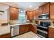 This well-lit kitchen features granite countertops and stainless steel appliances, and lots of storage at 12208 Mcmullen Loop, Riverview, FL 33569