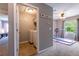 Convenient laundry room adjacent to another bedroom features a washer and dryer for easy chores at 12208 Mcmullen Loop, Riverview, FL 33569
