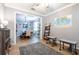 Tile flooring and a view of the dining room in a multipurpose living area at 12208 Mcmullen Loop, Riverview, FL 33569