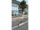 Inviting two-story condo with well-maintained landscaping and a beautiful palm tree at 1221 Drew St # C2, Clearwater, FL 33755