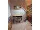 Home office space with modern desk, floating shelf, and contemporary lighting at 1221 Drew St # C2, Clearwater, FL 33755