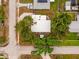Aerial view of the home showing the layout, landscaping, and nearby streets at 1242 74Th N St, St Petersburg, FL 33710