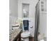 Bathroom with toilet and shower featuring neutral colors and modern styling at 1242 74Th N St, St Petersburg, FL 33710