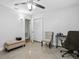 Bedroom with neutral tones, featuring a closet and a doorway with a view into the hall at 1242 74Th N St, St Petersburg, FL 33710