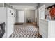 Spacious garage with refrigerator, storage, and decorative rug at 1242 74Th N St, St Petersburg, FL 33710