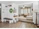 Open-concept living room with neutral paint, wood-look floors, and a cozy sitting area at 1242 74Th N St, St Petersburg, FL 33710