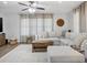 Bright living room boasting a comfortable couch, plush carpet, and neutral paint at 1242 74Th N St, St Petersburg, FL 33710
