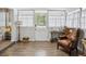 Relaxing living room featuring modern furnishings and smooth access to outdoor entry at 1242 74Th N St, St Petersburg, FL 33710