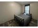 Cozy bedroom with a queen-sized bed and simple decor, a perfect retreat at 12426 Terra Ceia Ave, New Port Richey, FL 34654
