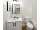 A bathroom featuring modern fixtures, a large mirror, and a combination shower and tub at 12437 Foxmoor Peak Dr, Riverview, FL 33579