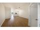 Open living room with new laminate floors and a ceiling fan at 12437 Foxmoor Peak Dr, Riverview, FL 33579