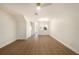 Spacious living area featuring wood-look flooring and neutral wall color at 12437 Foxmoor Peak Dr, Riverview, FL 33579