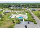 Aerial view of the skate park, parking lot, and landscaping at 13612 S Village Dr # 5201, Tampa, FL 33618