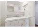 Bathroom featuring white vanity, granite countertops, and modern fixtures at 13612 S Village Dr # 5201, Tampa, FL 33618
