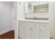 Bathroom featuring double sink vanity and updated fixtures at 13612 S Village Dr # 5201, Tampa, FL 33618