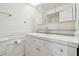 Clean bathroom with a vanity and a mirrored medicine cabinet at 13612 S Village Dr # 5201, Tampa, FL 33618