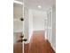 Bright entryway featuring wood floors leading to an open living space at 13612 S Village Dr # 5201, Tampa, FL 33618