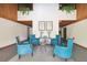 Lobby area with comfortable seating, decorative art, and a welcoming atmosphere at 13612 S Village Dr # 5201, Tampa, FL 33618