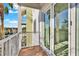 Balcony with a view of the palm trees and the lake at 1501 Doyle Carlton Dr # 303, Tampa, FL 33602