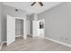 Spacious bedroom with hardwood floors, two closets and view to kitchen at 1501 Doyle Carlton Dr # 303, Tampa, FL 33602