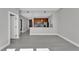 Open-concept living room with modern kitchen and hardwood floors at 1501 Doyle Carlton Dr # 303, Tampa, FL 33602