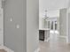 Open-concept living space with modern kitchen, balcony access, and bright natural light, ideal for entertaining and relaxation at 1501 Doyle Carlton Dr # 303, Tampa, FL 33602