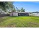 Expansive backyard with lush greenery, providing plenty of space for recreation and outdoor activities at 15820 Sapwood St, Tampa, FL 33624