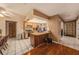 Open-concept kitchen featuring a center island, wood cabinets, and tile flooring at 15820 Sapwood St, Tampa, FL 33624