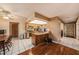 Open kitchen with breakfast bar and a view into the living area, ideal for entertaining at 15820 Sapwood St, Tampa, FL 33624