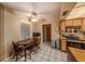 Cozy eat-in kitchen with a table and chairs next to a window for natural light at 15820 Sapwood St, Tampa, FL 33624