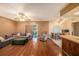 Bright and airy living room with sliding glass doors and easy access to kitchen and dining at 15820 Sapwood St, Tampa, FL 33624