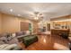 Comfortable living room, showcasing an open design flowing into the kitchen and dining areas at 15820 Sapwood St, Tampa, FL 33624