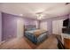 Large main bedroom with ample closet space and ceiling fan at 15820 Sapwood St, Tampa, FL 33624