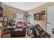 Comfortable living room with recliner chair, shelving, and natural light at 15917 Crying Wind Dr, Tampa, FL 33624