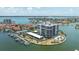 Waterfront condo featuring boat slips, a community pool, tennis courts and covered parking at 1651 Sand Key Estates Ct # 54, Clearwater Beach, FL 33767