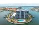 Waterfront condo featuring boat slips, a community pool, and covered parking at 1651 Sand Key Estates Ct # 54, Clearwater Beach, FL 33767