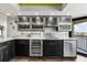Contemporary kitchen boasts quartz countertops, stainless steel appliances, and ample cabinet space at 1651 Sand Key Estates Ct # 54, Clearwater Beach, FL 33767
