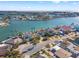 An aerial view of the neighborhood showcasing the beautiful waterfront homes and boat docks at 17077 Dolphin Dr, North Redington Beach, FL 33708