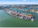 An aerial view of the waterfront neighborhood, with a focus on the property and its pool and dock at 17077 Dolphin Dr, North Redington Beach, FL 33708
