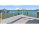Private dock featuring composite decking and direct access to the open water at 17077 Dolphin Dr, North Redington Beach, FL 33708