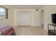 Bedroom with neutral tones, generous closet space, and open layout at 2020 Douglas Ave, Dunedin, FL 34698