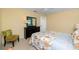 Bedroom showcases neutral walls, complemented by a queen-sized bed and ample natural light at 2096 Massachusetts Ne Ave, St Petersburg, FL 33703